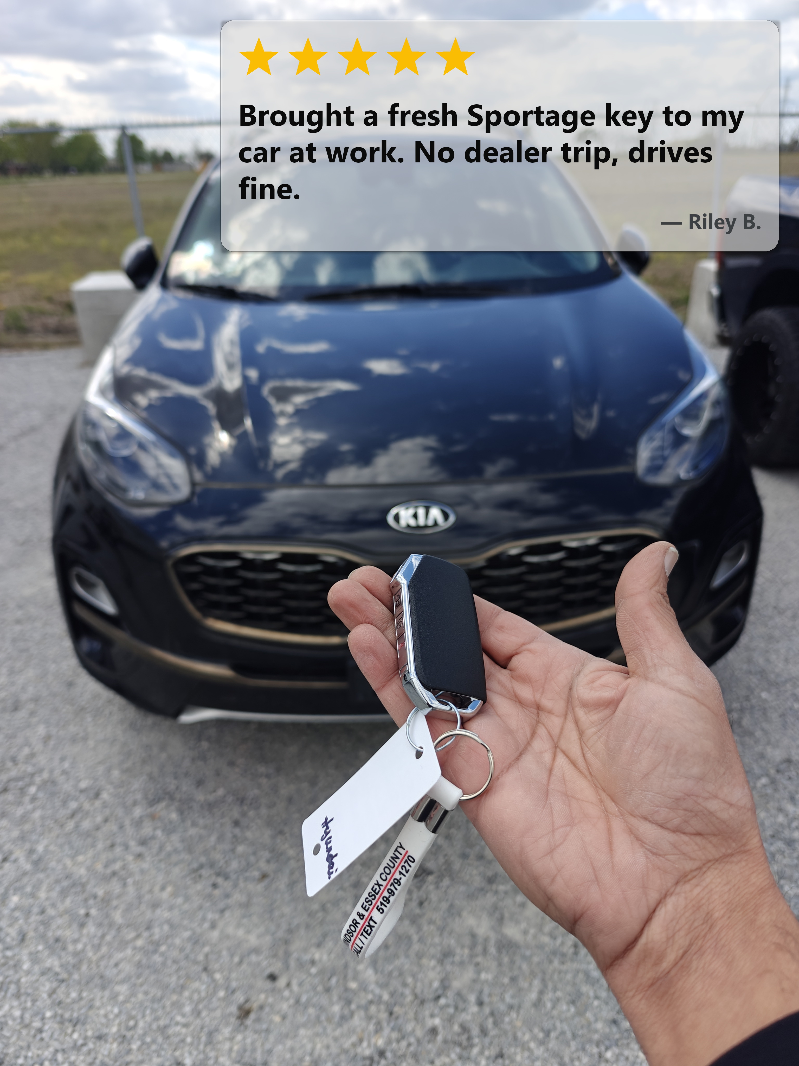 Dark blue Kia Sportage QL near Devonshire Mall in Windsor with a freshly cut and programmed spare four-button smart proximity key by Canadian Locksmiths